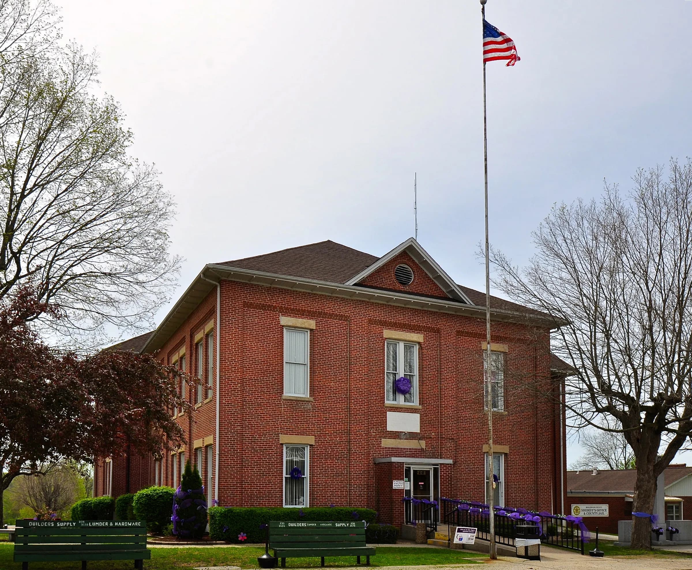The red brick Bollinger County Courthouse in Marble Hill in spring